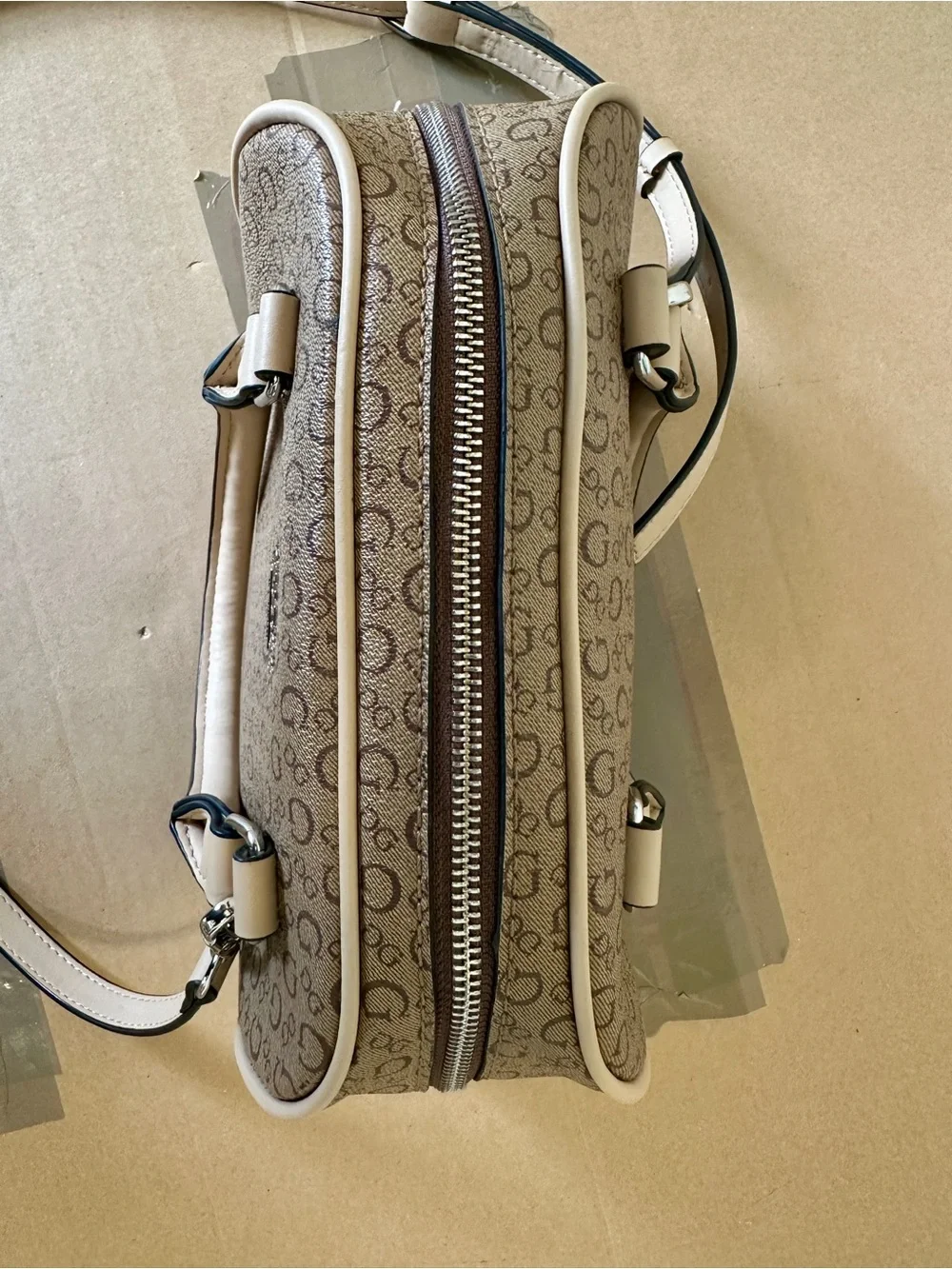 The GUESS Logo Print Small Satchel Top Handle Bag in beige and brown